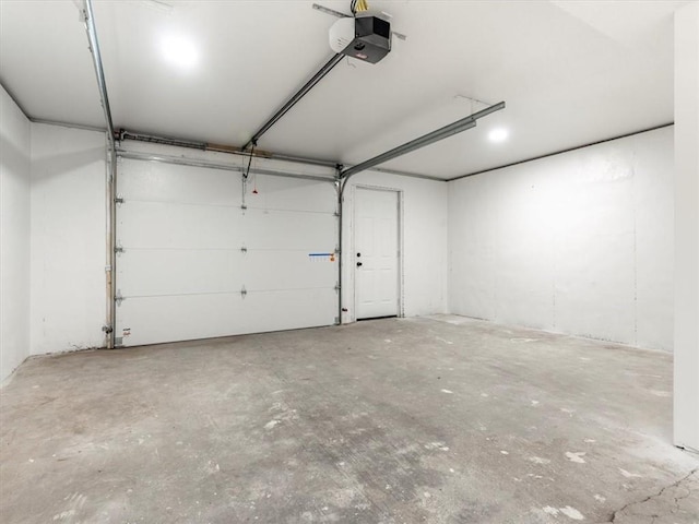 garage featuring a garage door opener