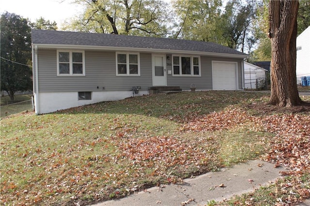 single story home with a garage and a front yard