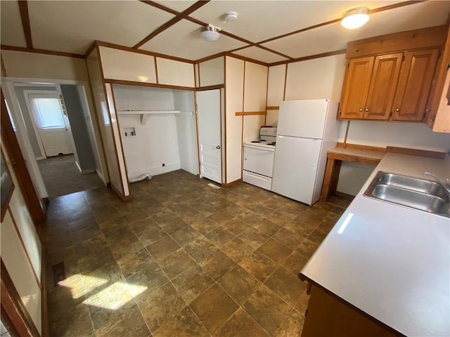 kitchen featuring sink and white appliances