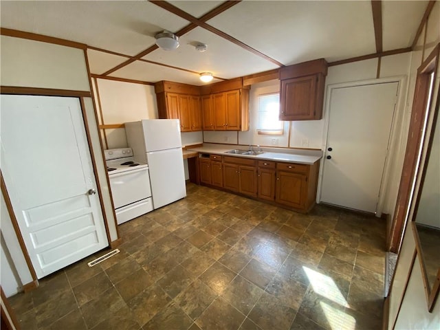 kitchen with white appliances and sink