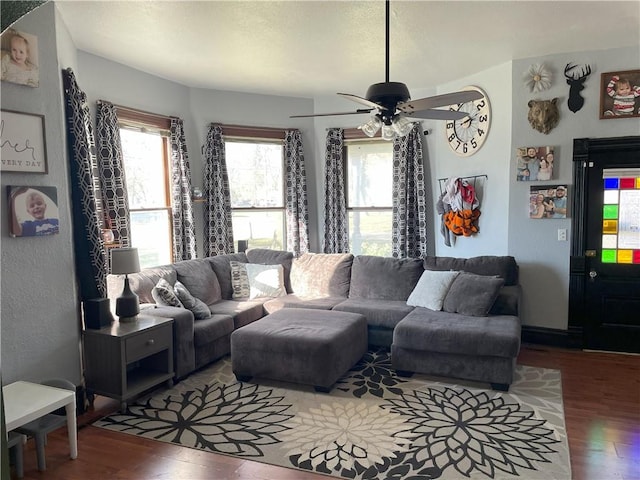 513 W Ohio St, Butler, MO 64730 - living area featuring wood finished floors and a ceiling fan