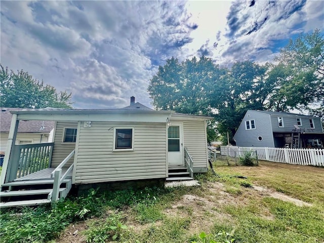 10406 E Lexington Ave, Independence, MO 64053 - back of house featuring entry steps and a deck