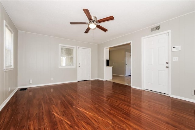 spare room featuring dark hardwood / wood-style floors and ceiling fan