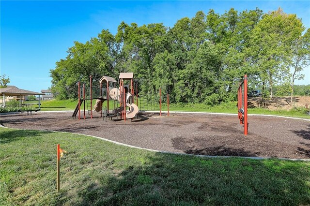 community play area with a yard