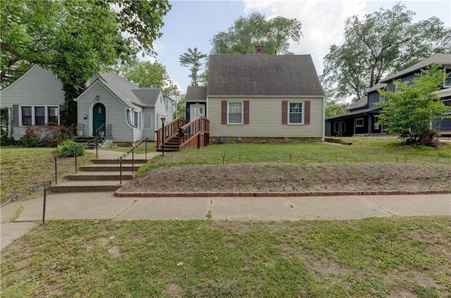 view of front of house featuring a front lawn