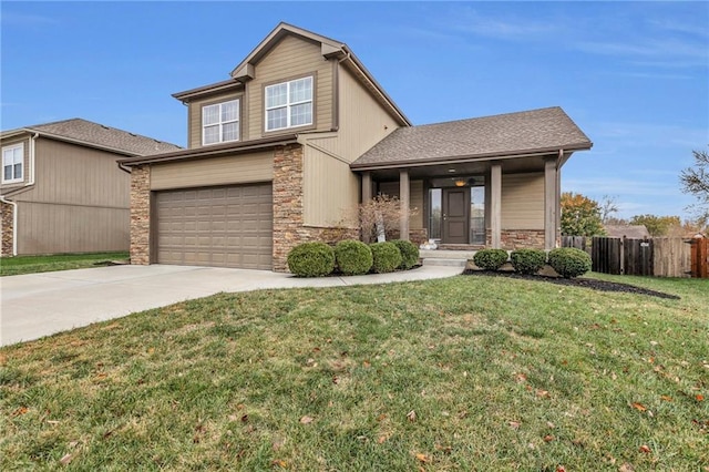 craftsman inspired home with a front lawn and a garage