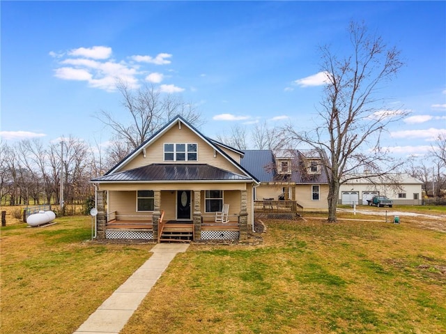 view of front of house with a front lawn and a porch