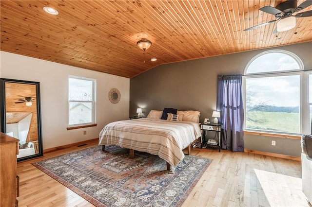 bedroom featuring vaulted ceiling, light hardwood / wood-style flooring, ceiling fan, and wood ceiling