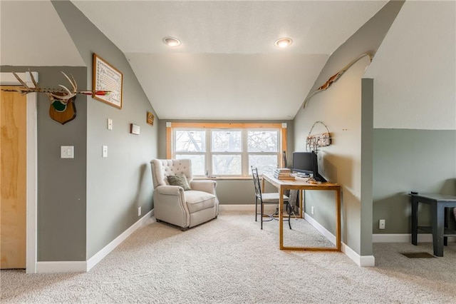 office with carpet and vaulted ceiling