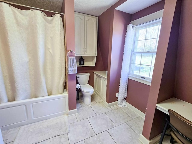 full bathroom featuring tile patterned floors, toilet, a healthy amount of sunlight, and baseboards