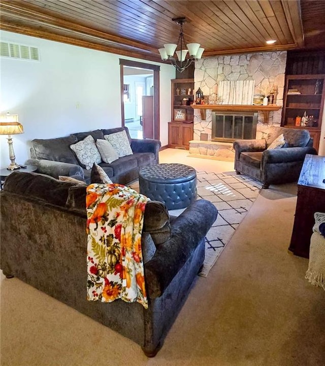 carpeted living area featuring built in features, visible vents, wood ceiling, crown molding, and a chandelier