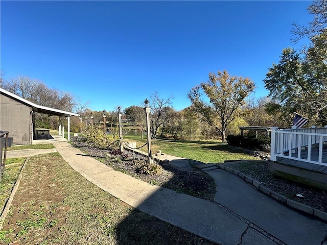 view of yard with a carport