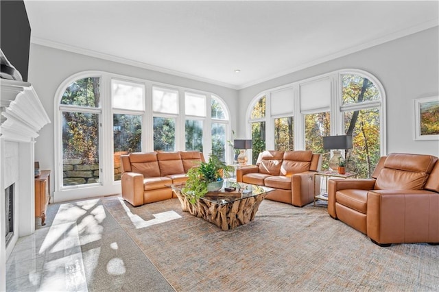 sunroom / solarium featuring a fireplace