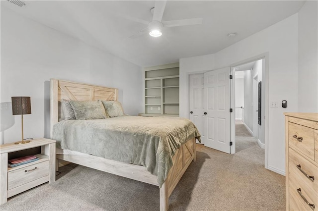 bedroom with baseboards, a ceiling fan, and light colored carpet