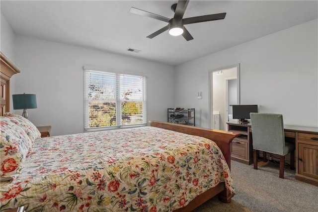 bedroom featuring a ceiling fan and light colored carpet