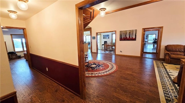 hall with dark hardwood / wood-style floors