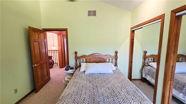 bedroom featuring light carpet and a closet