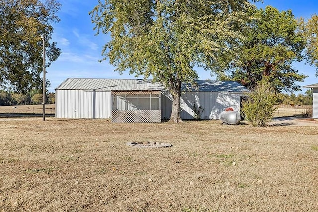 exterior space with an outbuilding