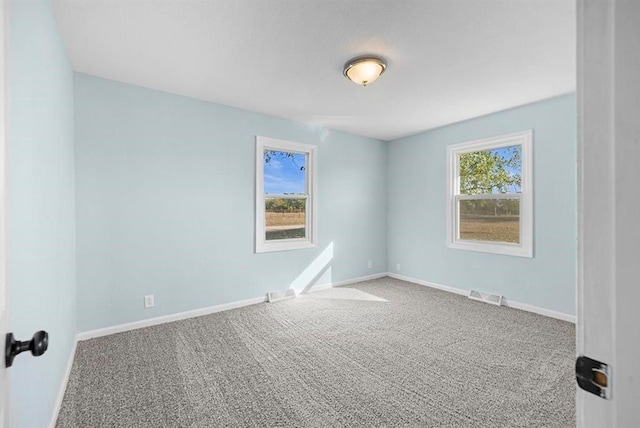 view of carpeted spare room