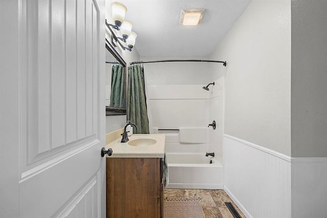 bathroom with vanity and shower / bath combination with curtain