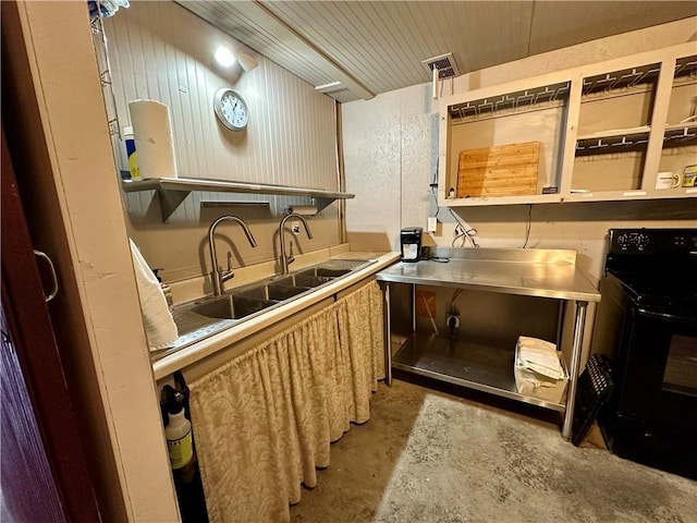 kitchen with sink and black range oven