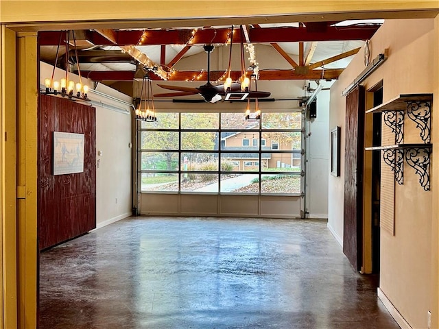 unfurnished room featuring concrete floors