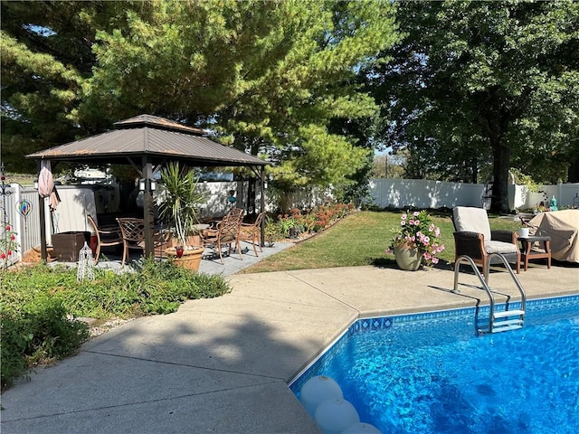 view of pool with a gazebo and a patio area