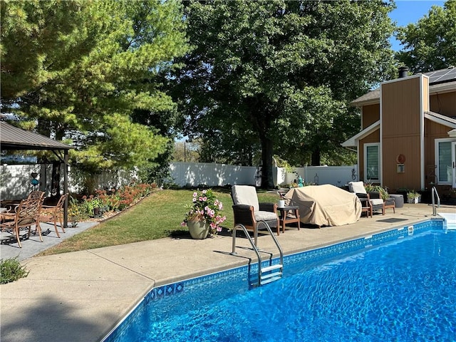 view of pool featuring a gazebo and a patio area