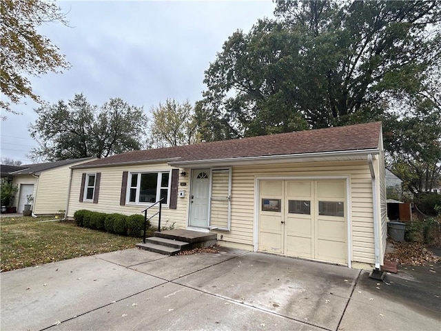 ranch-style home with a garage