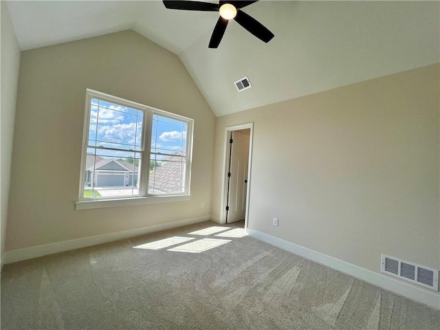 7709 NE 106th Pl, Kansas City, MO 64157 - unfurnished bedroom with carpet, lofted ceiling, and a ceiling fan