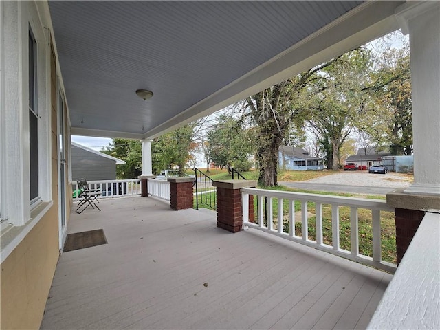 deck with covered porch