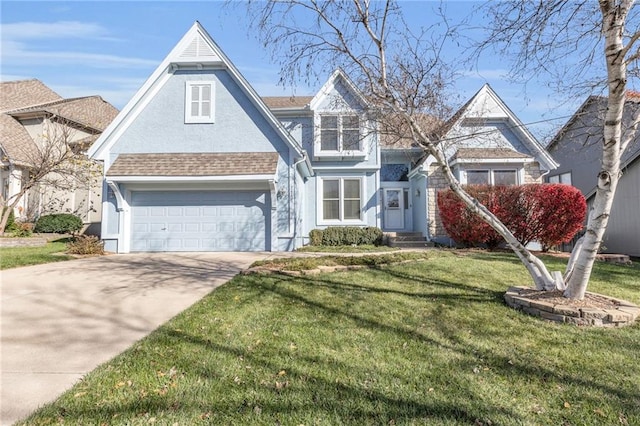 view of front of property with a garage and a front lawn