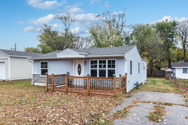 view of front facade with a deck