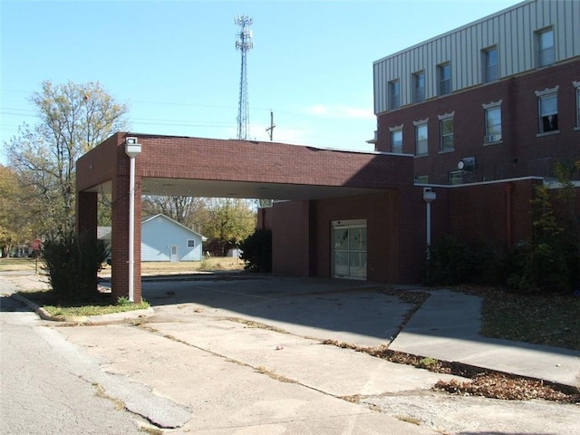 view of parking with a carport