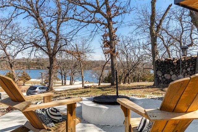 view of patio with a water view