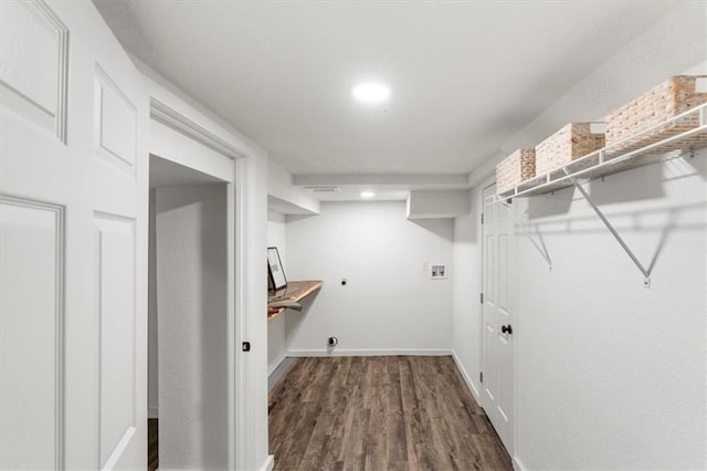 washroom with baseboards, washer hookup, laundry area, wood finished floors, and electric dryer hookup