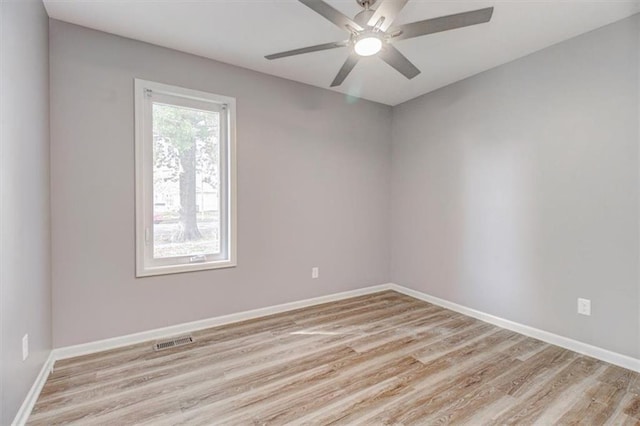 unfurnished room with light hardwood / wood-style floors and ceiling fan