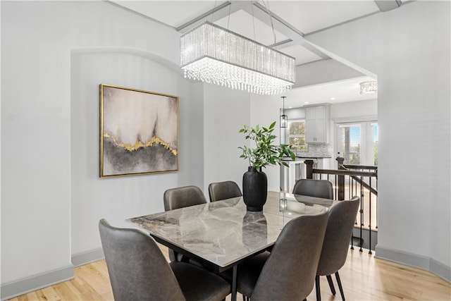 dining area featuring light wood-type flooring