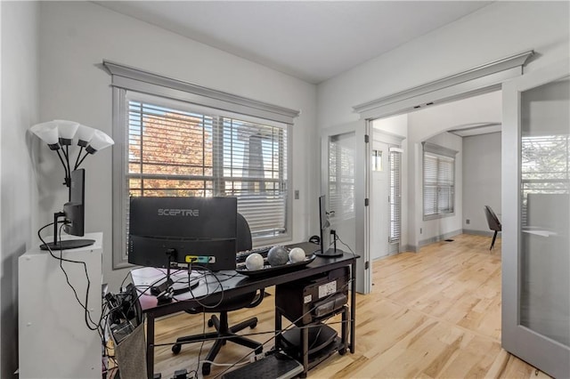 home office featuring hardwood / wood-style flooring