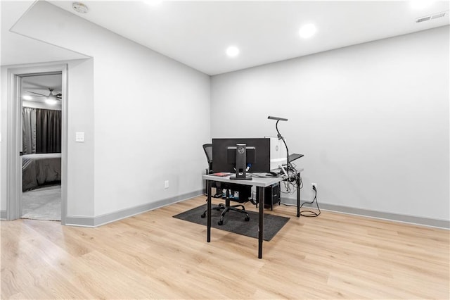 home office featuring light hardwood / wood-style floors