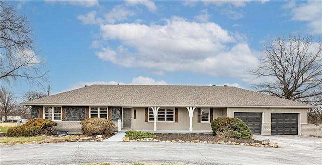 single story home featuring a garage