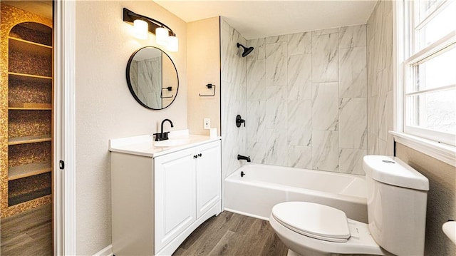 15700 E 202nd St, Peculiar, MO 64078 - bathroom with shower / tub combination, wood finished floors, toilet, and vanity