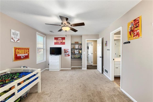 bedroom with light carpet, baseboards, visible vents, and ceiling fan