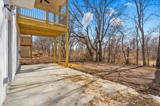 wooden deck with a patio area