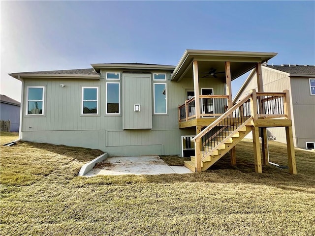 back of house featuring stairway, a patio, and a ceiling fan