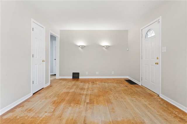 foyer with light wood-type flooring