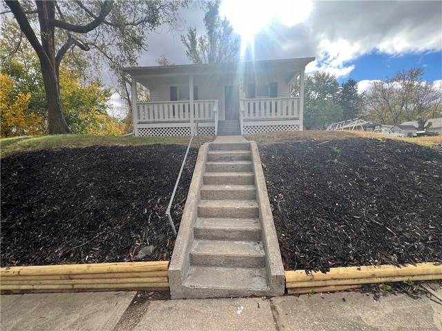 view of front of home featuring covered porch