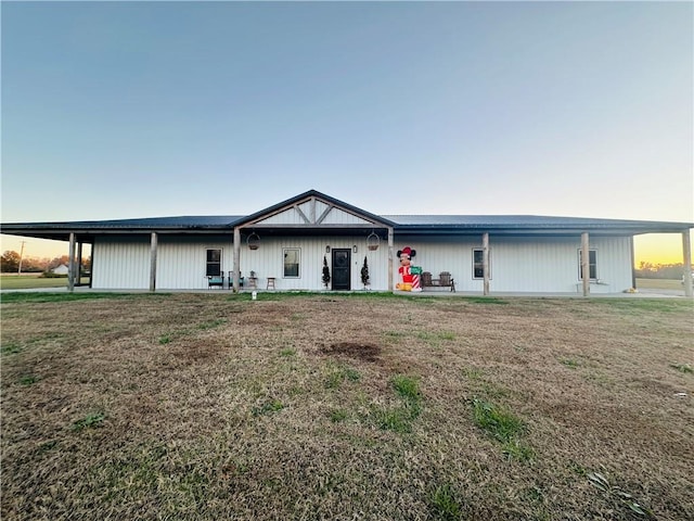 view of front of home with a yard