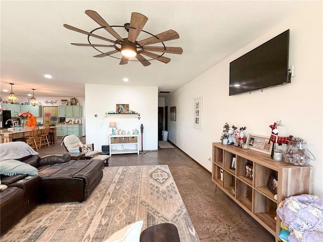 living room with concrete flooring and ceiling fan