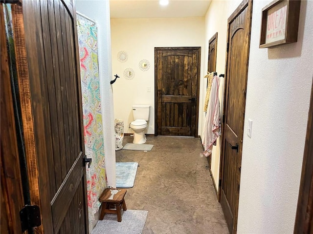 bathroom featuring toilet